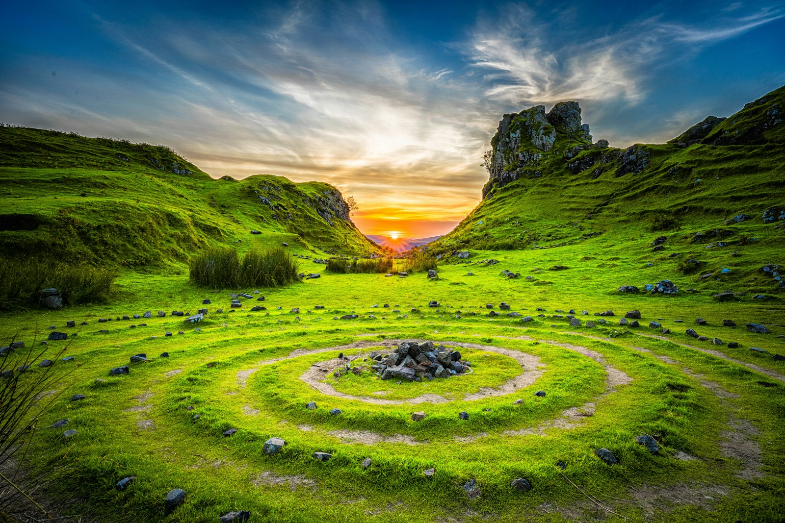 Green rolling hill country at sunrise